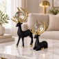 Set de 3 Statues Cerf Décoratives avec Boule – Noir et Doré Set de 3 Statues Cerf Décoratives avec Boule – Noir et Doré