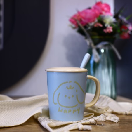 Tasse à café en céramique avec cuillère